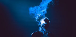 smoke coming out of person's mouth