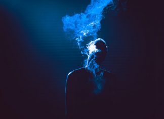 smoke coming out of person's mouth