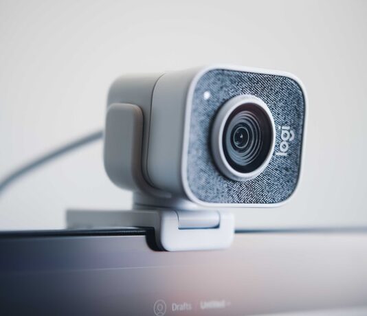 Communication across the World made Convenient through Free Webcam Services black and silver speaker on white table