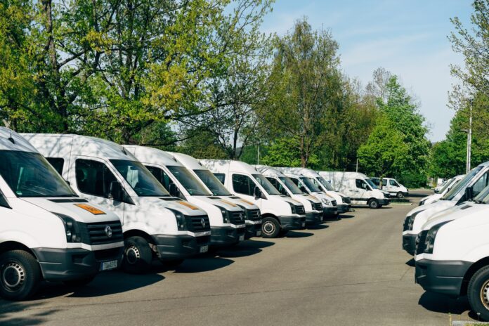 Photo by Markus Winkler cars parked on parking lot during daytime