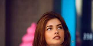 selective photography of woman in white crew-neck shirt