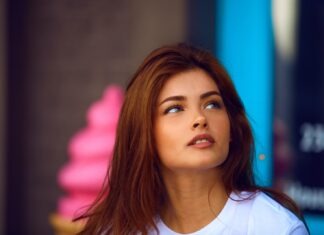 selective photography of woman in white crew-neck shirt
