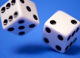 Best Bets of the Weekend 2 white dices on blue surface