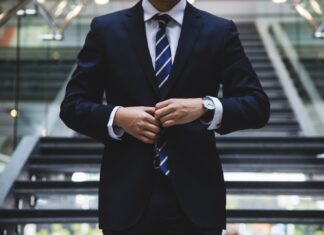 What You Need to Learn to Become a Successful CEO person standing near the stairs