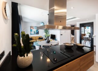 15 Awesome Tips To Your Way To A Sparkling Clean Home round white wooden table near kitchen island