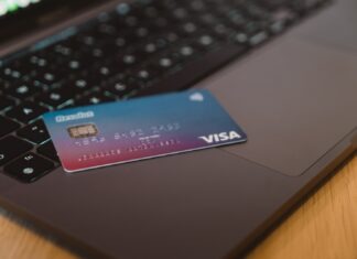 Online Casinos that Accept UPayCard blue and white visa card on silver laptop computer