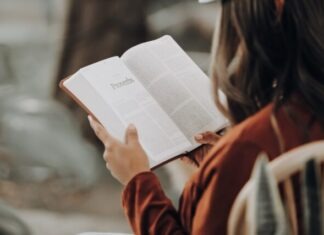 Ten Practical Ways to Improve Your Reading and Writing Skills girl reading book