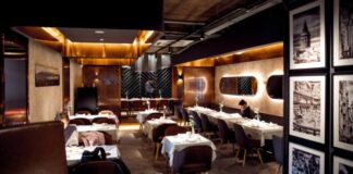 person sitting at the corner of the room