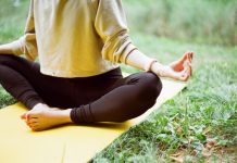 Look After Your Body and Mind With These Foolproof Techniques  woman in brown long sleeve shirt and black pants sitting on white textile