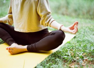 Look After Your Body and Mind With These Foolproof Techniques  woman in brown long sleeve shirt and black pants sitting on white textile