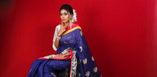 woman in blue and yellow sari dress