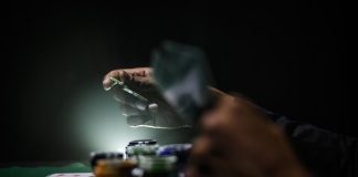 selective focus photography of poker chips
