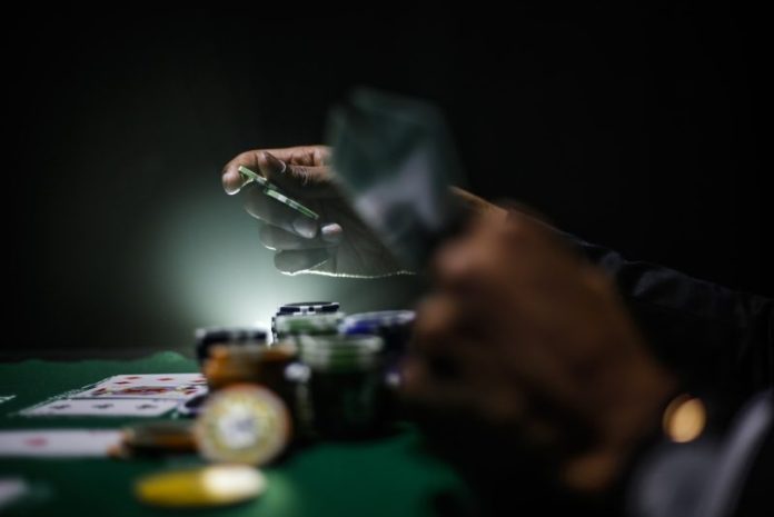 Photo by Keenan Constance selective focus photography of poker chips