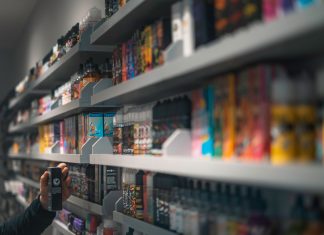Different Ways to Use HHCP distillate woman in black shirt standing in front of store shelf