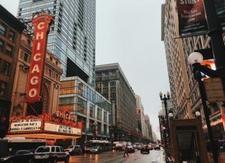 Impacts of Bitcoin Mining in Illinois different vehicles on road near Chicago city buildings