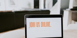 macbook pro on brown wooden table