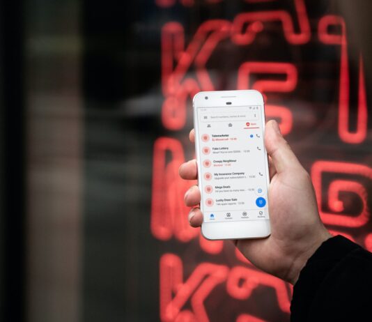person holding white samsung galaxys 4