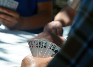 A Beginner’s Guide to Playing poker Online people playing cards