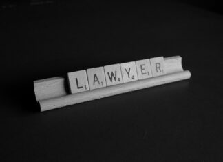 Why should I hire a catastrophic injury lawyer? brown wooden scrable