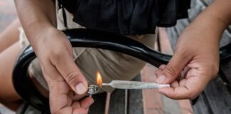 person holding silver and black lighter