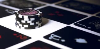 poker chip on white surface