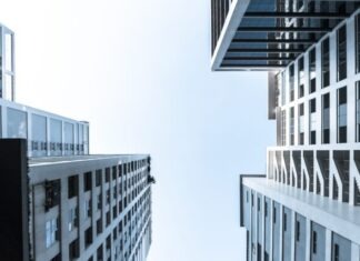 The Importance of Asphalt Maintenance for Commercial Properties white and blue concrete building