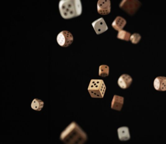 a group of dices flying in the air