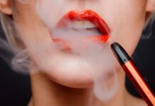 The Delightful World of Vaping and Food Pairing woman with red lipstick and red lipstick