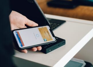 The Rise of Dash Payment Processors: Empowering Secure and Swift Transactions person holding black android smartphone