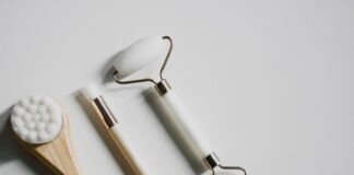 silver spoon and fork on white surface