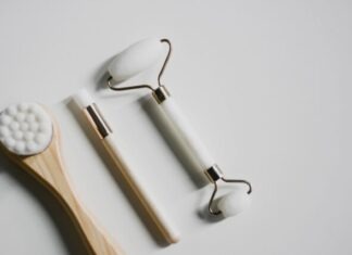 silver spoon and fork on white surface