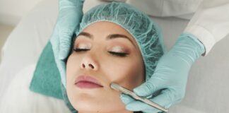 woman doing liposuction on her face
