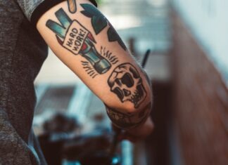 Tattoo Aftercare Tips: How To Maintain Your Ink And Keep It Looking Fresh person with sleeve tattoo