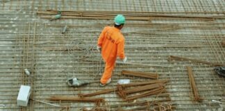 man walking on construction site