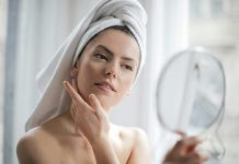 How To Choose the Right Products for Sensitive Skin and Dark Spots? A serene and elegant woman enjoys a skincare ritual, enhancing her natural beauty in the comfort of her home.