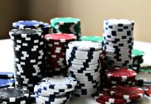 Luck as Aesthetic: Why Casino Games Look the Way They Do stacked poker chips with different colors