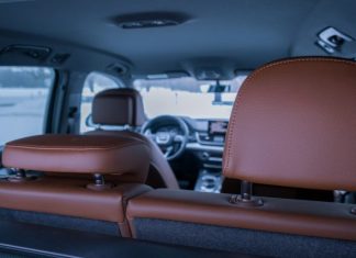 Wyoming Car Accident Laws the inside of a vehicle with a brown leather seat