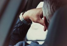 person wearing silver and gold bracelet
