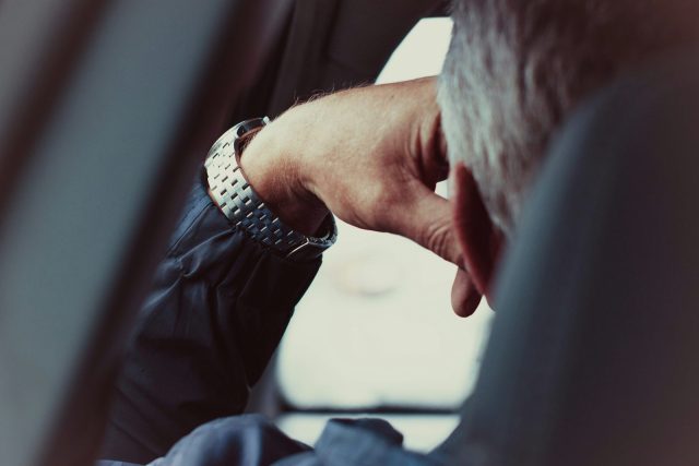 Photo by Marii Siia person wearing silver and gold bracelet