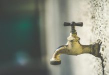 4 Telltale Signs You Might Have a Problem With the Well on Your Rural Property brass faucet with water droplets