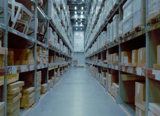 a large warehouse filled with lots of shelves