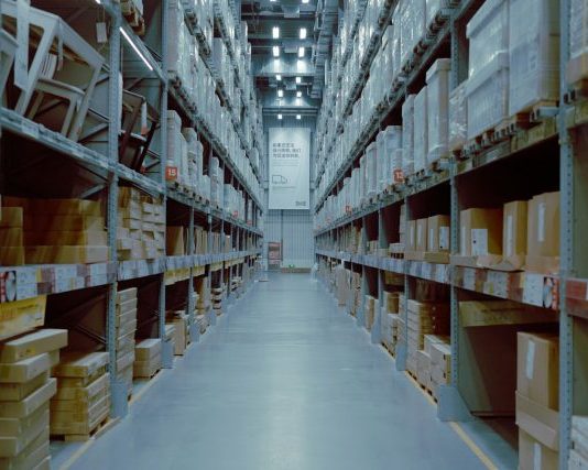 a large warehouse filled with lots of shelves
