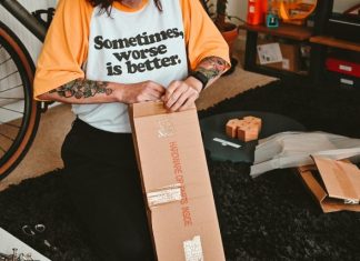 5 Benefits of Outsourcing Commercial Packing Operations a person with a box on the lap