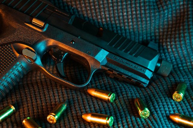 Photo by Taylor R black and silver semi automatic pistol