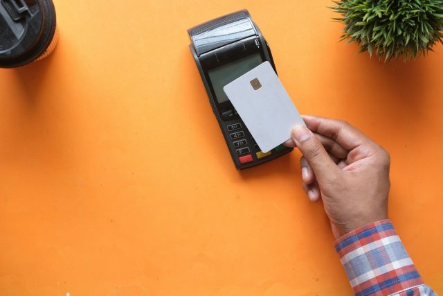 Photo by Towfiqu barbhuiya person holding black and white electronic device