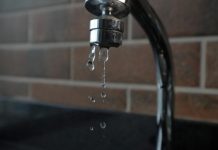 a faucet with water running from it's spout