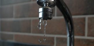 a faucet with water running from it's spout